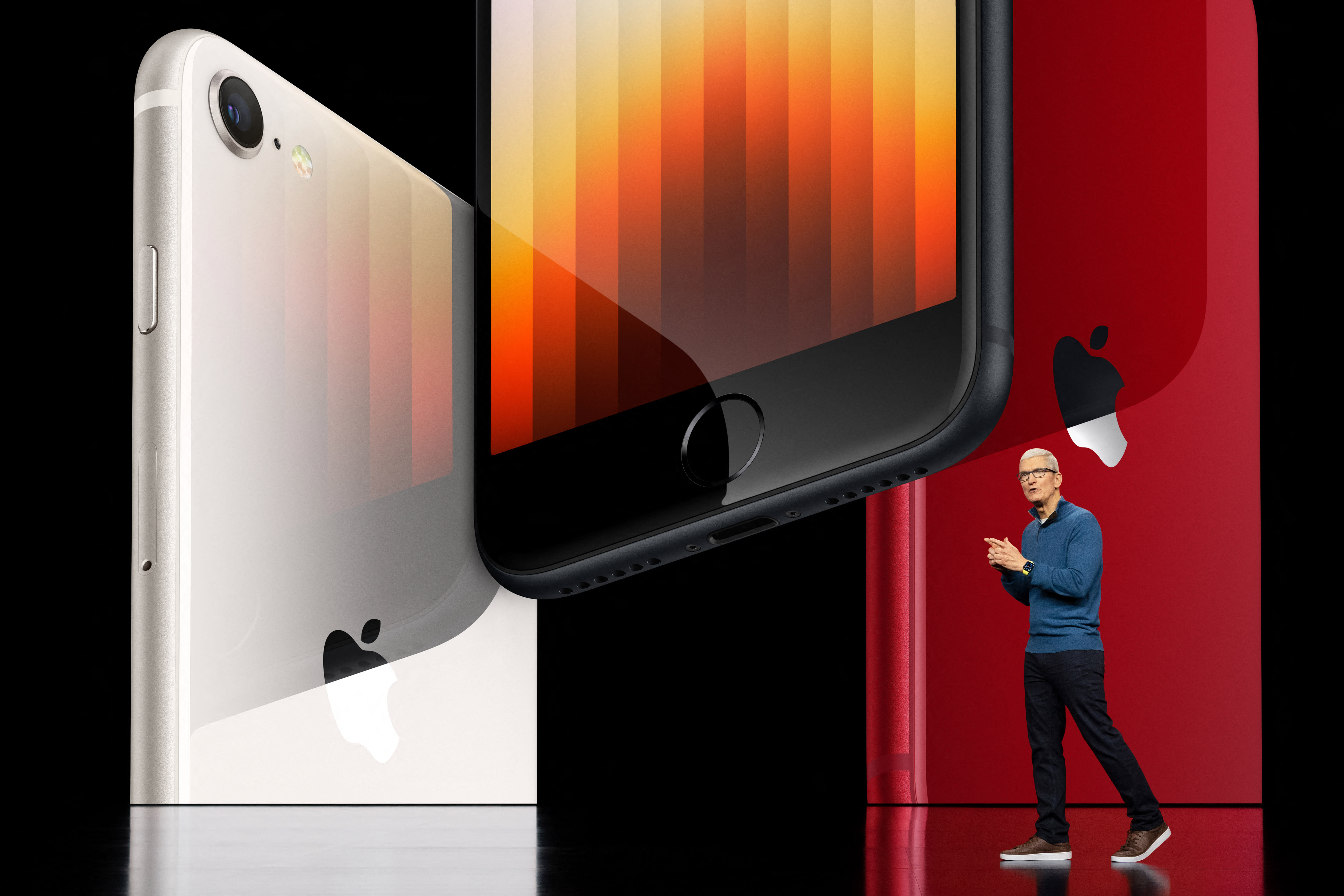 Apple CEO Tim Cook showcases the new iPhone SE featuring 5G and the A15 Bionic chip, during a special event at Apple Park in Cupertino, California on March 8, 2022. Apple CEO Tim Cook showcases the new iPhone SE featuring 5G and the A15 Bionic chip, during a special event at Apple Park in Cupertino, California on March 8, 2022.