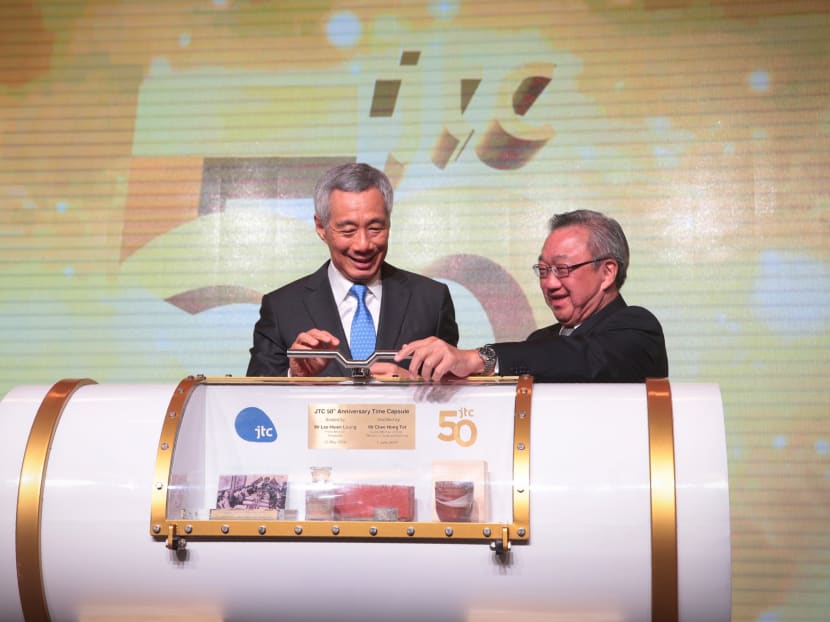 Prime Minister Lee Hsien Loong and JTC Chairman Dr Loo Choon Yong seal a time capsule at the JTC 50th anniversary dinner on May 25, 2018. The objects in the time capsule were carefully chosen to reflect the various milestones of Singapore’s industrialisation journey.