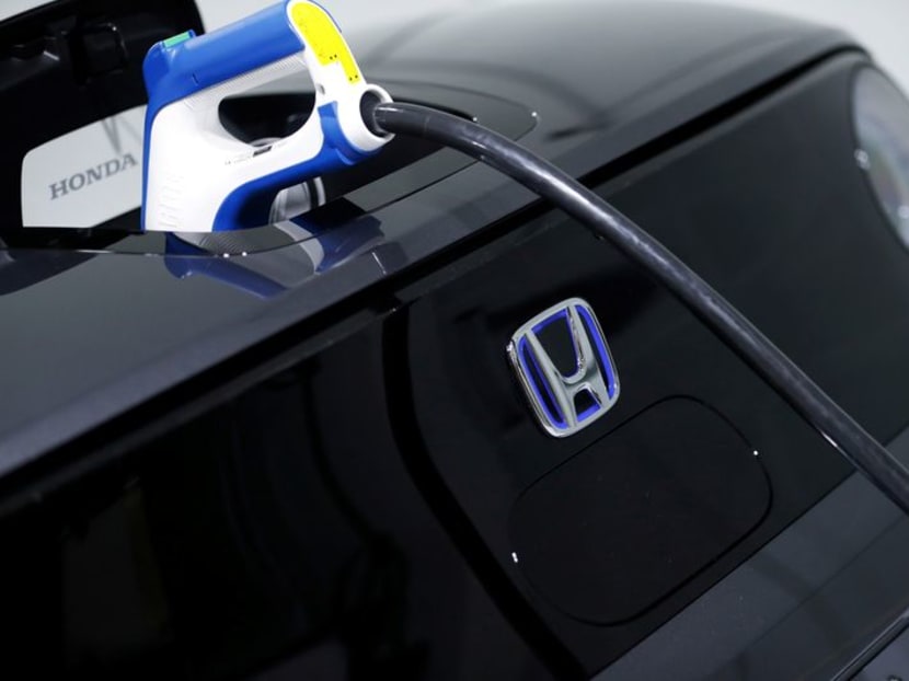 A Honda electric car is seen in Tokyo Motor Show in Tokyo, Japan October 24, 2019. REUTERS/Soe Zeya Tun/File Photo A Honda electric car is seen in Tokyo Motor Show in Tokyo, Japan October 24, 2019. REUTERS/Soe Zeya Tun/File Photo
