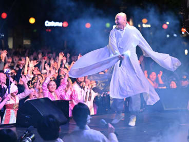 This picture taken on May 12, 2024 shows NewJeansNim performing during an electronic dance music event for the annual lotus lantern festival to celebrate the upcoming Buddha's birthday in Seoul.