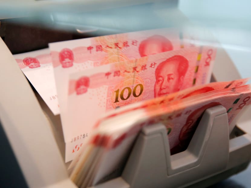 Chinese 100 yuan banknotes in a counting machine. Reuters file photo.