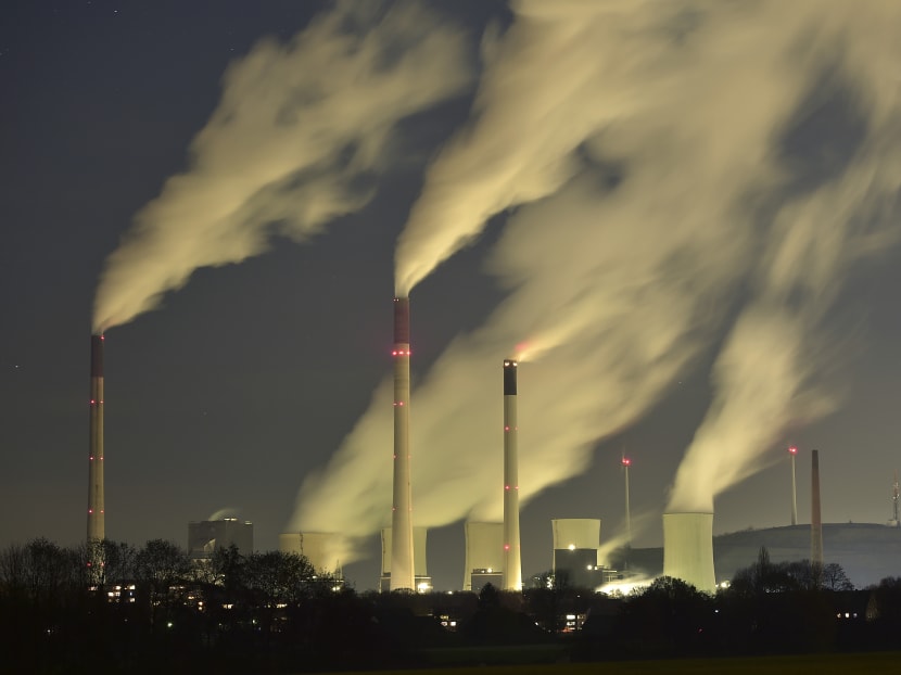 In this Nov 24, 2014 file photo, smoke streams from the chimneys of the E.ON coal-fired power station in Gelsenkirchen, Germany. Photo: AP