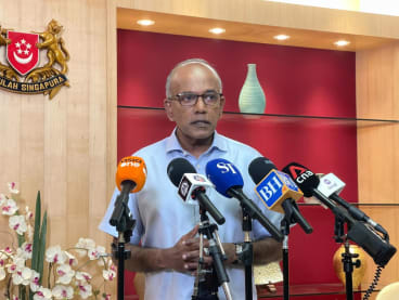 Law and Home Affairs Minister K Shanmugam speaking to reporters on March 25, 2024.