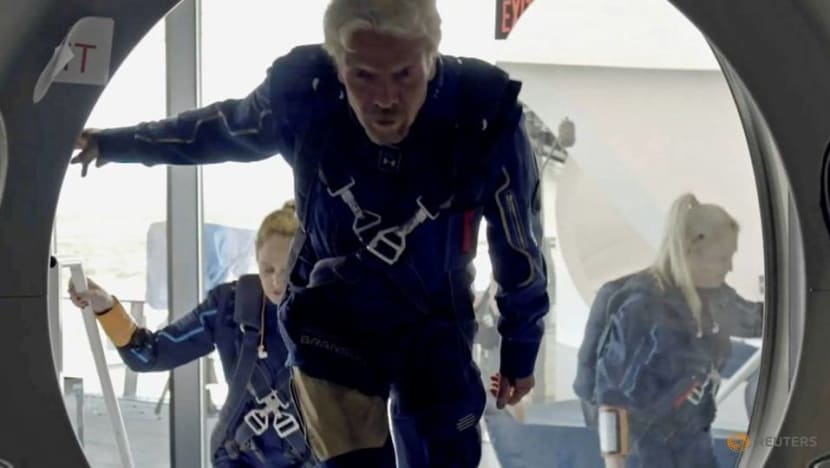 Virgin Galactic's Branson soars to space aboard rocket plane Virgin Galactic's Branson soars to space aboard rocket plane