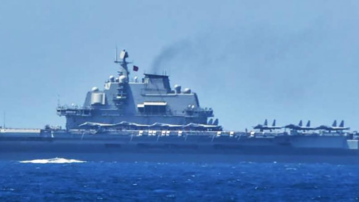 Japan says Chinese carrier entered its contiguous waters for first time