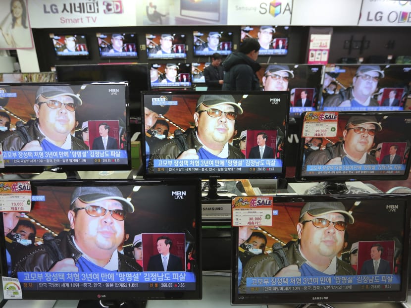 TV screens show pictures of Kim Jong Nam, the half-brother of North Korean leader Kim Jong Un, in Seoul. Kim was assassinated at an airport in Kuala Lumpur, telling medical workers before he died that he had been attacked with a chemical spray, a Malaysian official said Tuesday. Photo: AP