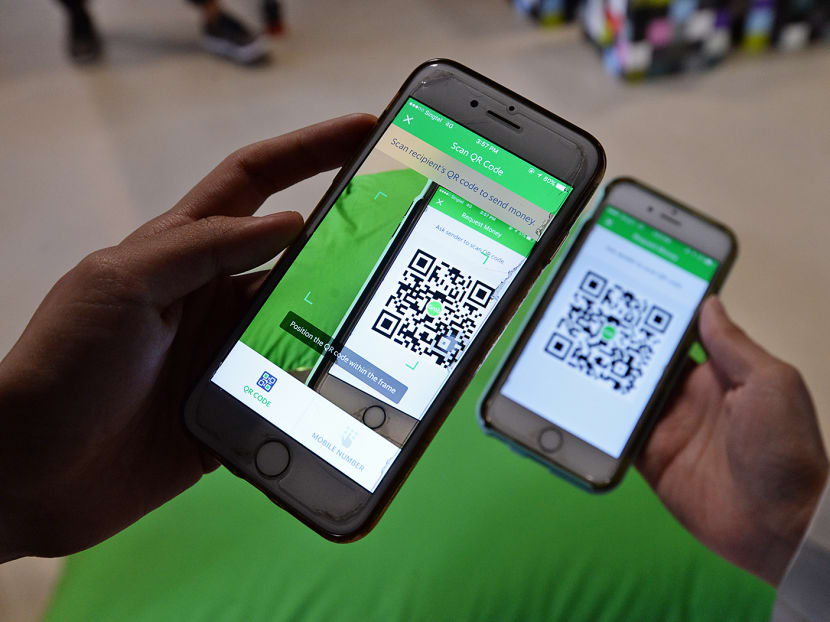 Transferring of money on GrabPay with the use of QR code. Photo: Robin Choo/TODAY