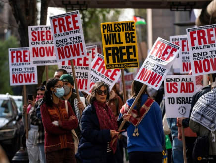 People demonstrate outside Columbia University, during the ongoing conflict between Israel and the Palestinian Islamist group Hamas, in New York City, US, April 23, 2024. 