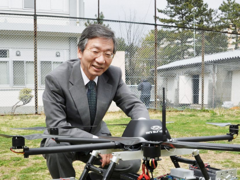 Prof Kenzo Nonami with a drone he developed for home delivery service. He expects to see an era of ‘thousands of drones flying above us’. Photo: Kyodo