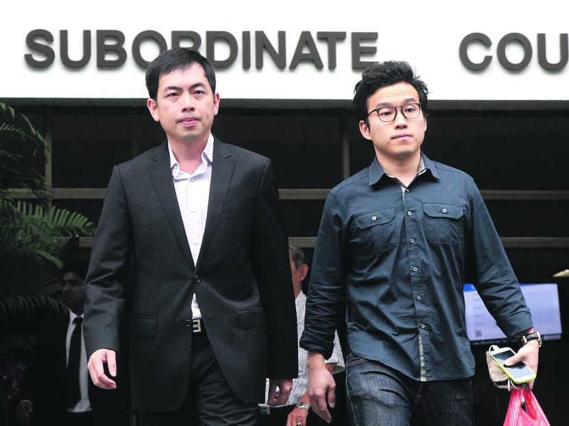 Xtron Director Choong (left) leaving the Subordinate Courts yesterday. Photo: Ooi Boon Keong