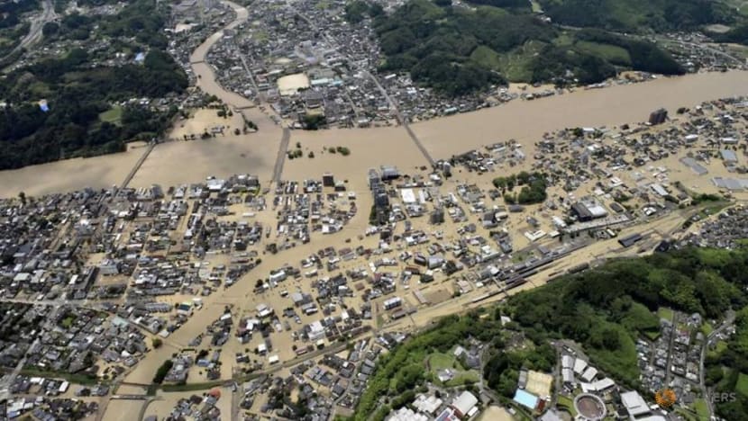 50 dead in Japan floods as rescuers 'race against time' 50 dead in Japan floods as rescuers 'race against time'