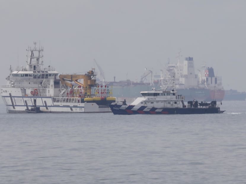 A Singapore Police Coast Guard vessel engaging a Malaysian government vessel in the sea off Tuas View Extension at around 3pm on Thursday, December 6, 2018. A Singapore Police Coast Guard vessel engaging a Malaysian government vessel in the sea off Tuas View Extension at around 3pm on Thursday, December 6, 2018.