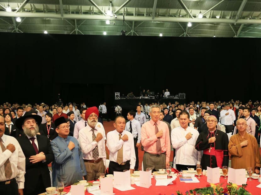 Prime Minister Lee Hsien Loong (centre) taking the pledge with various religious leaders at a Taoist Federation silver jubilee dinner in April. If leaders subscribe to any faith, it is crucial to draw a line between their personal beliefs and professional work. TODAY file photo Prime Minister Lee Hsien Loong (centre) taking the pledge with various religious leaders at a Taoist Federation silver jubilee dinner in April. If leaders subscribe to any faith, it is crucial to draw a line between their personal beliefs and professional work. TODAY file photo