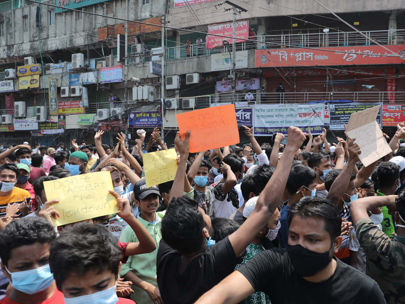 Shop workers protest against restrictions imposed as a preventative measure against Covid-19 in Dhaka, Bangladesh on April 5, 2021.