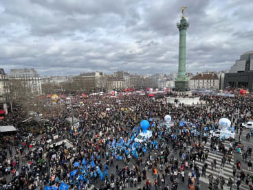 Protestors gather to attend a demonstration in Paris on March 23, 2023. 