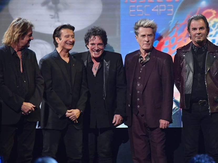 Inductees Gregg Rolie, Steve Perry, Neal Schon, Ross Valory and Jonathan Cain of Journey speak onstage at the 32nd Annual Rock & Roll Hall Of Fame Induction Ceremony at Barclays Center on April 7, 2017 in New York City. Photo: AFP