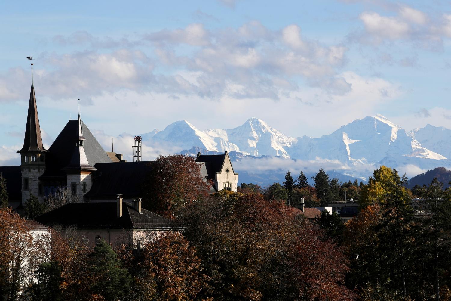 A general view of the snow-covered mountains of the Bernese Alps, Eiger, Moench and Jungfrau, as seen from Bern, Switzerland on Oct 28, 2020. 
