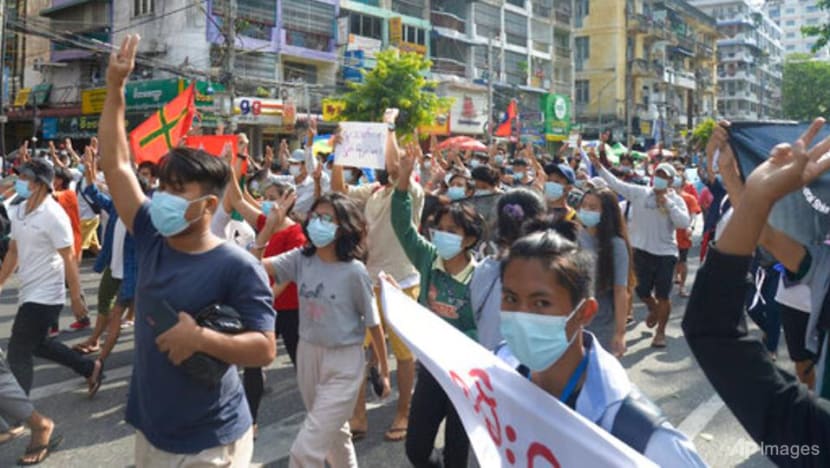 Flash mobs in Myanmar's biggest city avoid deadly response