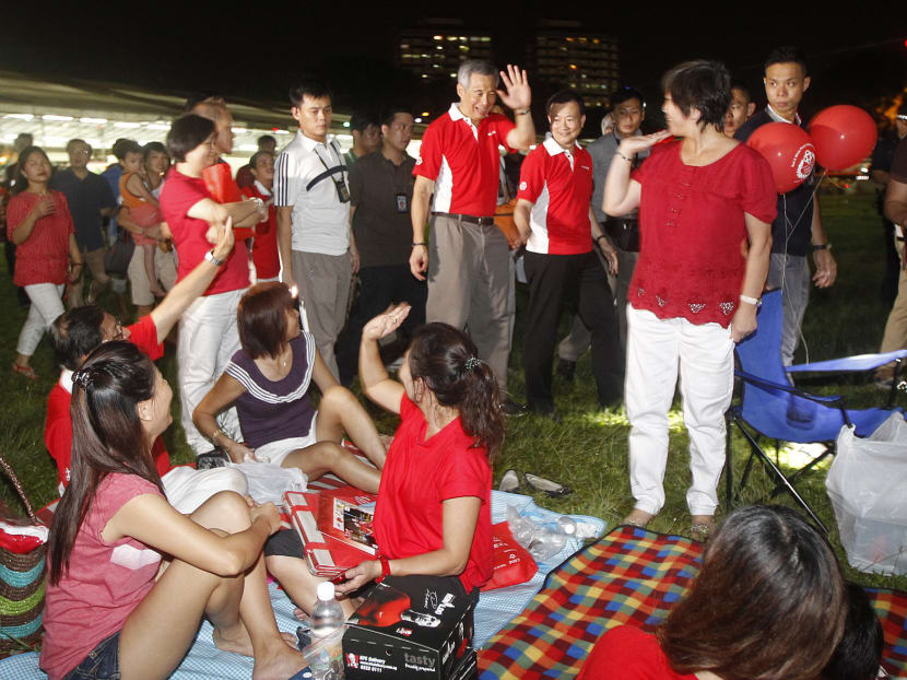 PM Lee Hsien Loong at the "Red & White Picnic Under the Stars" at the open field next to Hougang MRT Station on 14 july 2014,photo by Wee Teck Hian