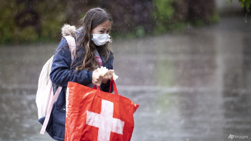 Cases soar but Swiss eschew lockdown as COVID-19 law vote looms
