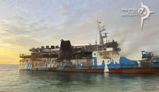 Death scene in burned Filipino ferry moves rescuers to tears
