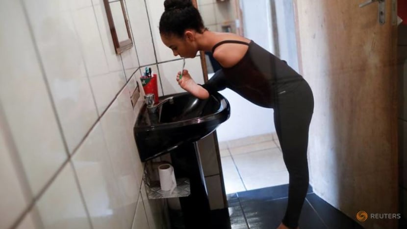Brazilian ballerina born without arms soars with her attitude Brazilian ballerina born without arms soars with her attitude