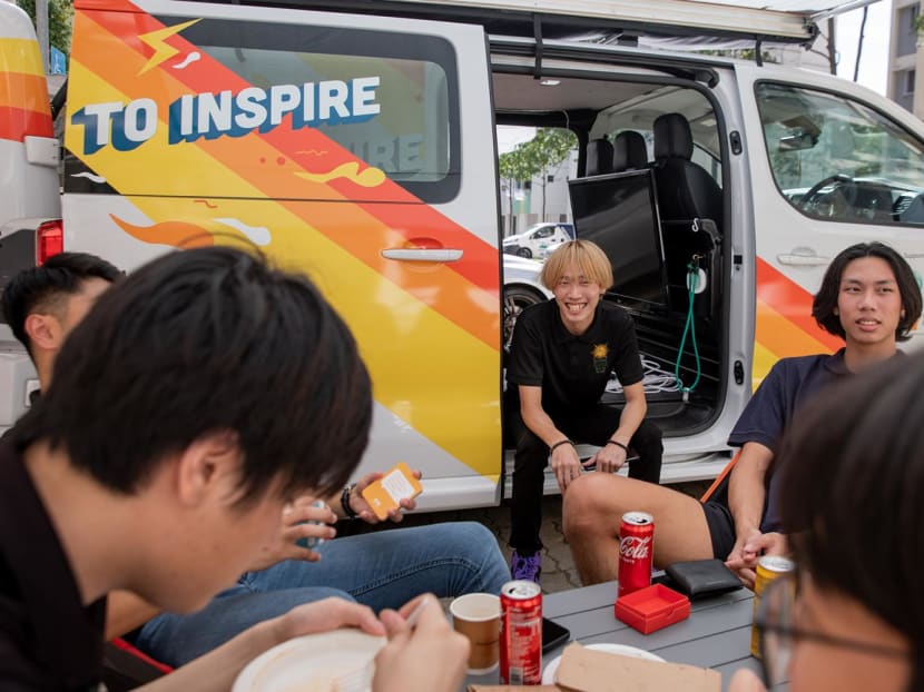 Teenagers supported by Youth Guidance Outreach Services gathering at the launch of the Mobile Outreach Support Team van on May 29, 2023. 
