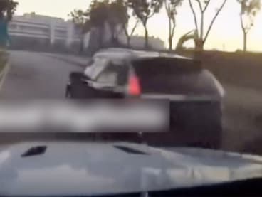 An image taken from a video posted on social media. The footage is purportedly from a white Mercedes-Benz and shows a black Saab that was involved in a fatal accident in Tampines a few moments afterwards.