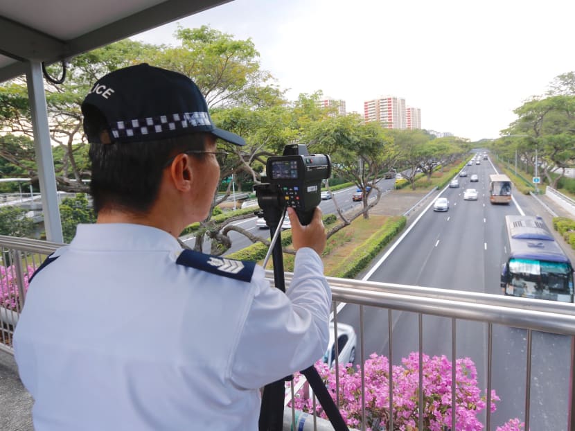 A traffic police officer at work. When Peter Tang Joo Yong was stopped by the traffic police, he pleaded with the officer to give him a chance because he was “old”.
