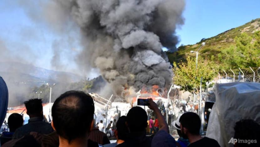 Fire burns tents, structures in Greek refugee camp Fire burns tents, structures in Greek refugee camp