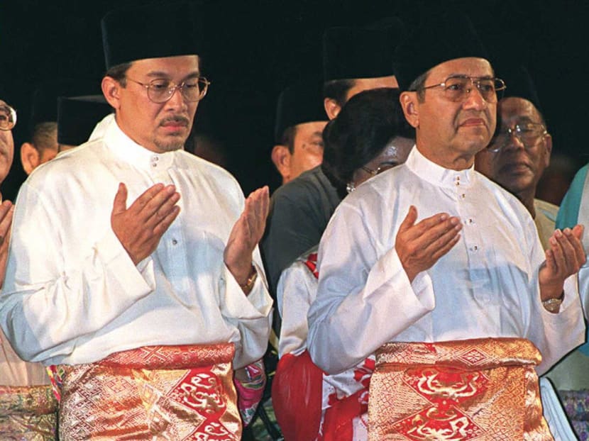 Anwar Ibrahim and Dr Mahathir Mohammad in 1996. AFP file photo
