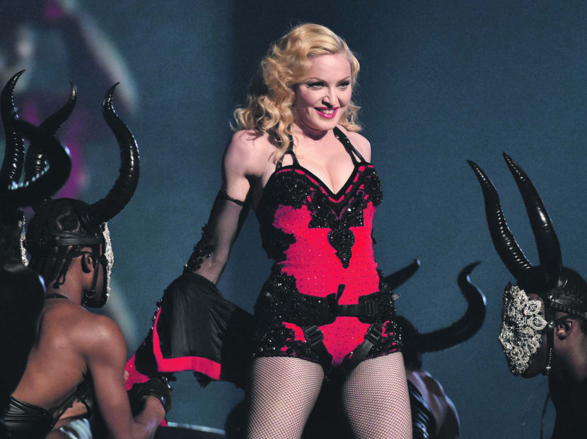 FILE - In this Feb. 8, 2015, file photo, Madonna performs at the 57th annual Grammy Awards in Los Angeles. Madonna, who co-owns Tidal with Jay Z, Beyonce and others, says it is just the beginning for the streaming service that’s had some troubles since its launch in March. (Photo by John Shearer/Invision/AP, File)