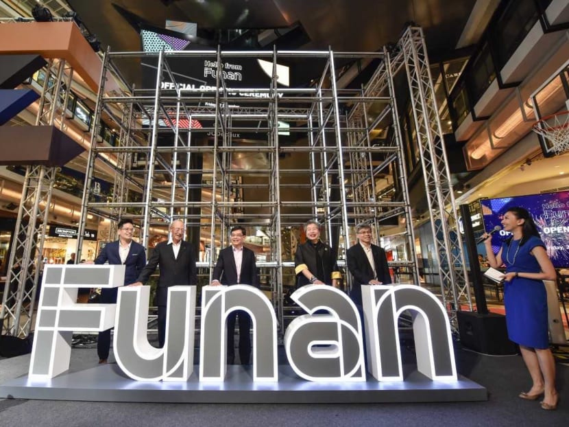 Deputy Prime Minister Heng Swee Keat, who is also Finance Minister (centre), pictured as he officially opened the revamped Funan mall on Friday (Dec 27) alongside senior corporate figures.