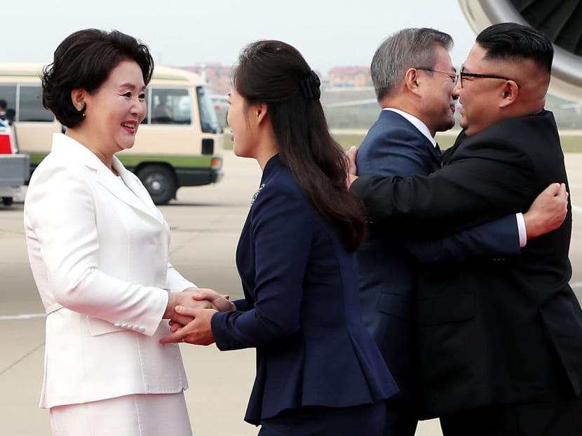 Photo of the day: South Korean President Moon Jae-in is greeted by North Korean leader Kim Jong-un during an official welcome ceremony at Pyongyang Sunan International Airport, in Pyongyang, North Korea on September 18, 2018.
