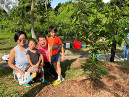 The author, Raymond Lim (second from right), and his family pictured in June 2023, during a tree planting exercise they participated in. He and his wife, Diane, are currently homeschooling both their children.