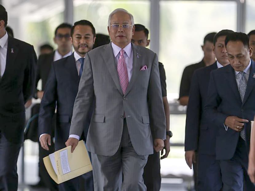 Malaysian Prime Minister Najib Razak arrives in Parliament to table the Election Commission’s (EC) report on the redrawing of electoral boundaries. Photo: Malay Mail Online