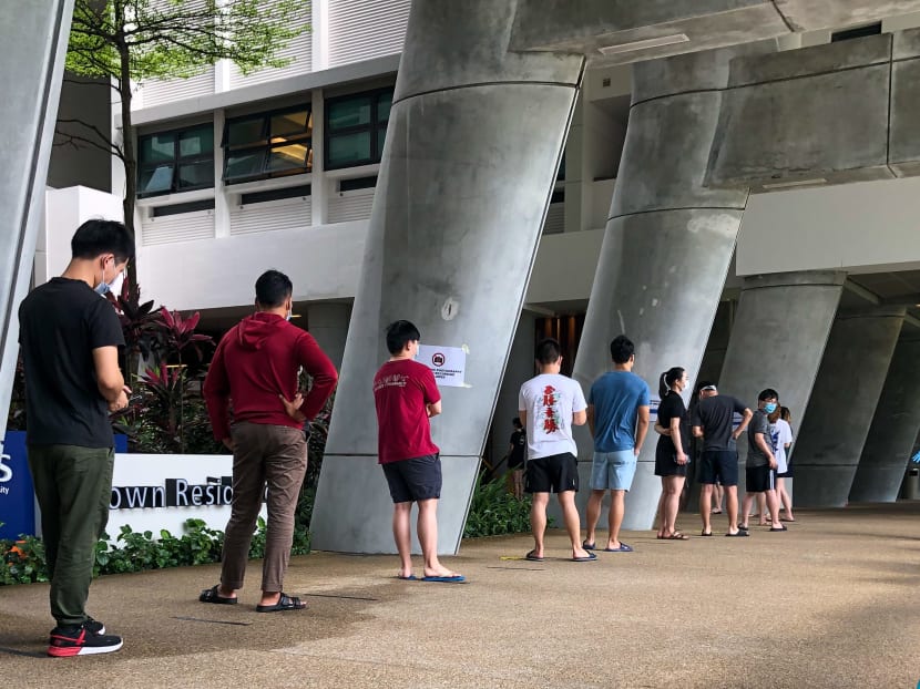 NUS UTown residents queueing up to be swabbed for Covid-19 on March 23, 2021 after traces of the virus were found in wastewater there.