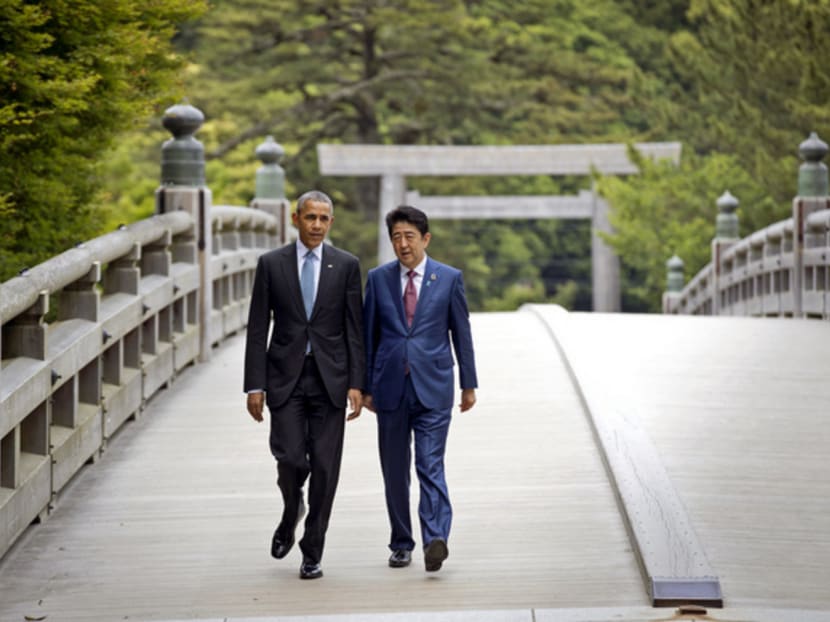 US President Barack Obama (left) and Japanese Prime Minister Shinzo Abe visiting the Ise Grand Shrine yesterday. Mr Obama said his historic visit to Hiroshima today will underline the dangers of warfare and the need to work towards peace. Photo: AP