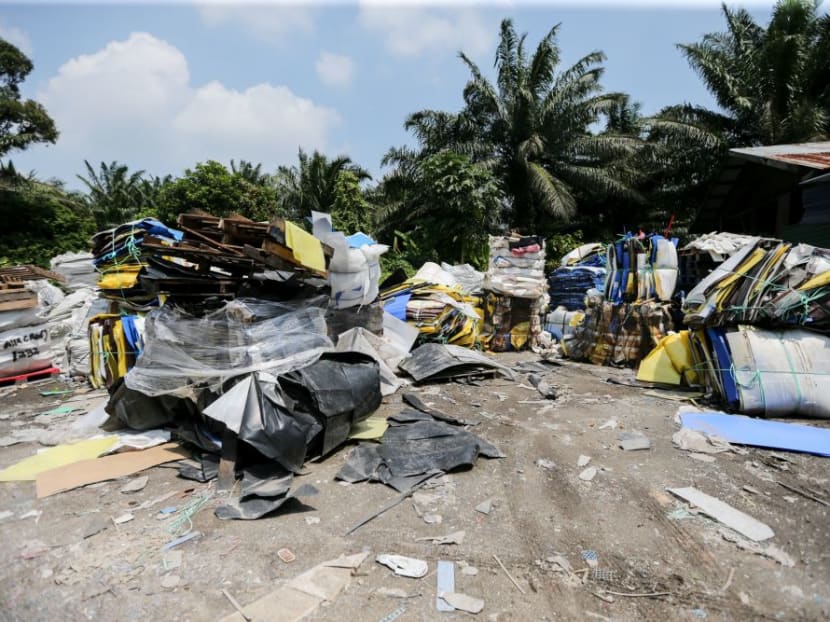 The site of an alleged illegal Chinese plastic recycling plant in Selangor, Malaysia. Many errant recycling firms, believed to be from China and operating without permits, are using Malaysian landfills to illegally dump toxic plastic waste. The site of an alleged illegal Chinese plastic recycling plant in Selangor, Malaysia. Many errant recycling firms, believed to be from China and operating without permits, are using Malaysian landfills to illegally dump toxic plastic waste.