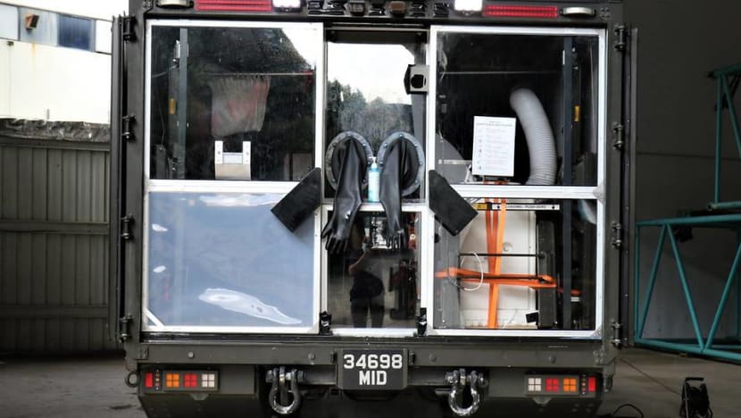 Like a 'giant N95 mask': Safer, faster COVID-19 testing of migrant workers with new mobile swab station Like a 'giant N95 mask': Safer, faster COVID-19 testing of migrant workers with new mobile swab station