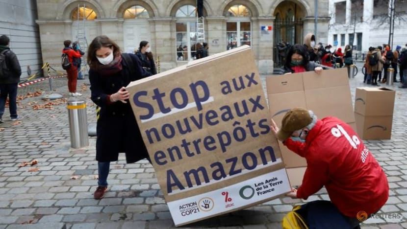 Boxed in: French activists protest against Amazon's expansion Boxed in: French activists protest against Amazon's expansion