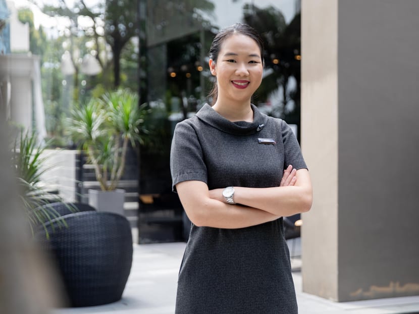 Senior guest service executive Freida Ng, 28, at Quincy Hotel on July 16, 2021.
