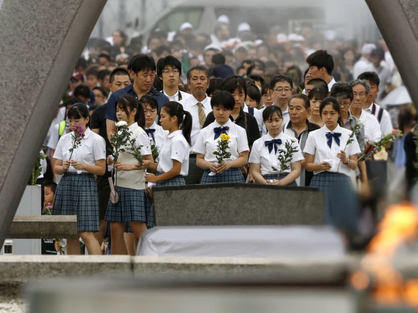 Photo of the day: People pray in front of the cenotaph at Peace Memorial Park in Hiroshima, Japan, on Aug 6, 2019, the 74th anniversary of the 1945 atomic bombing of the city.
