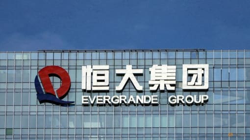 Evergrande debt setback, Oceanwide blow rattle China property stocks