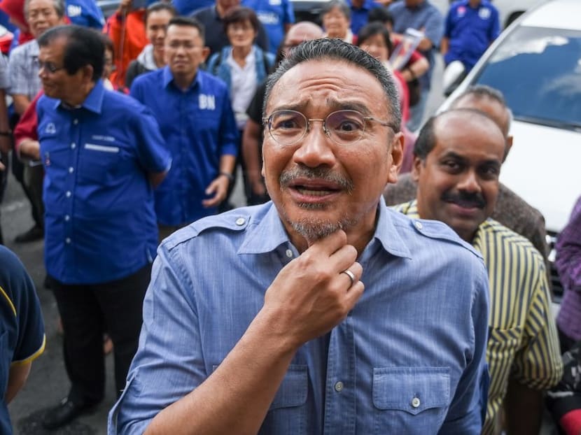 Mr Hishammuddin Hussein is suspected of brokering defections for Umno members.