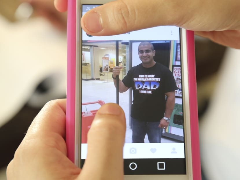 A photo of Orlando Night Club shooter, Omer Mateen, on his wife's phone. Mateen killed 49 people and had a past record of beating his ex-wife and abusing his wife. A photo of Orlando Night Club shooter, Omer Mateen, on his wife's phone. Mateen killed 49 people and had a past record of beating his ex-wife and abusing his wife.