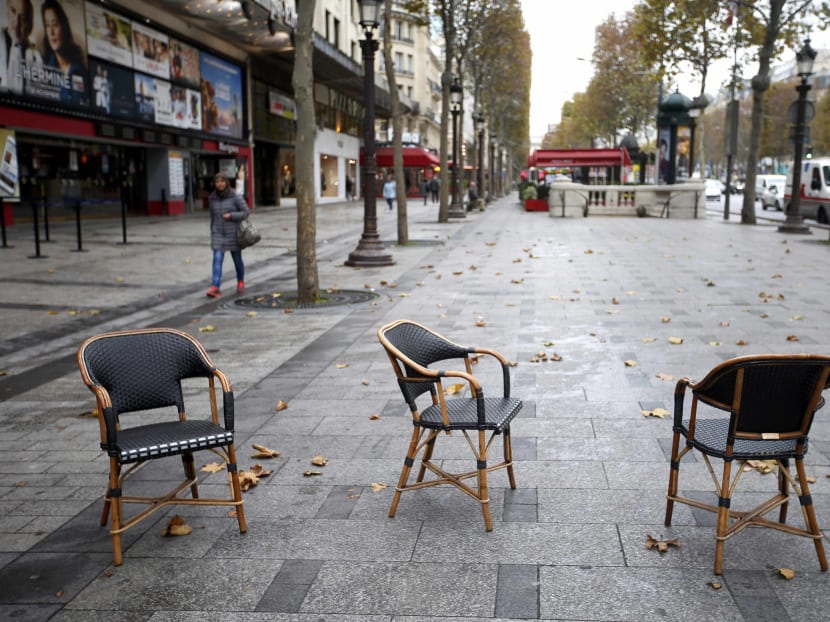 Chairs from an empty terrace cafe are seen on the Champs-Elysees in Paris, France, November 16, 2015, after last Friday's series of deadly attacks in the French capital.  Photo: Reuters