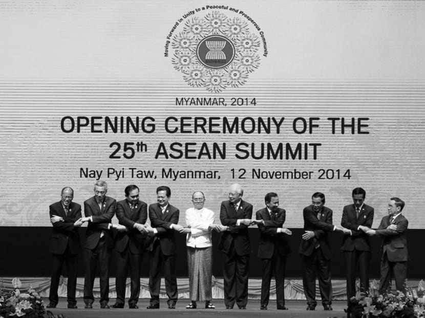 Leaders posing for a photo during the  opening ceremony of the 25th ASEAN summit in Myanmar last November. ASEAN is not quite ready for the AEC, but with some significant improvements to how the ASEAN Secretariat is run, it may just be possible. Photo: Reuters