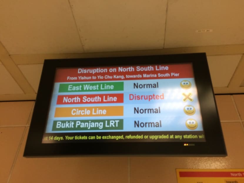An announcement screen seen at Raffles Place MRT during the service disruption. Photo: Jimmy Yap