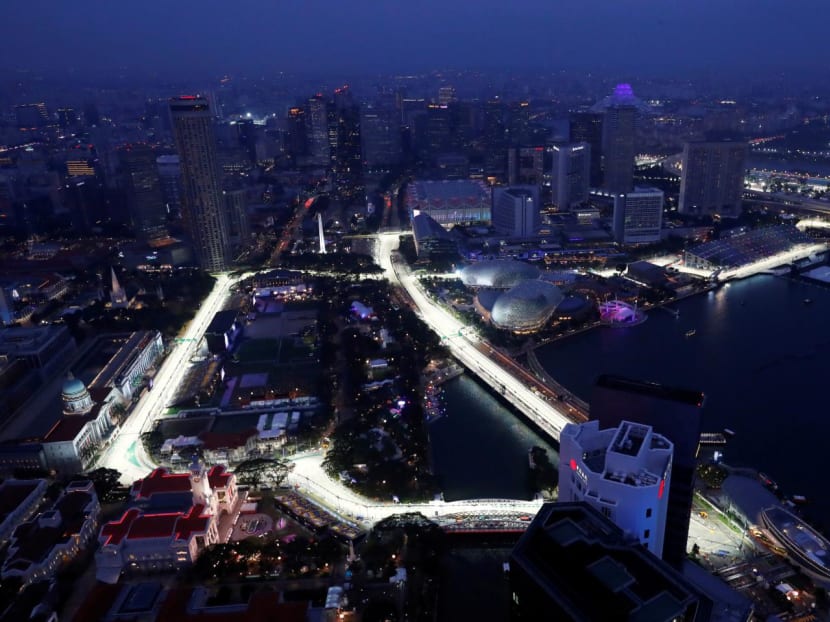 An aerial view of the Marina Bay area in September 2019, with several hotels in the background overlooking the lighted street circuit for the Formula One night race in Singapore.